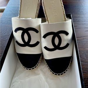 Chanel espadrilles worn once. Pearl white and black. Excellent condition.